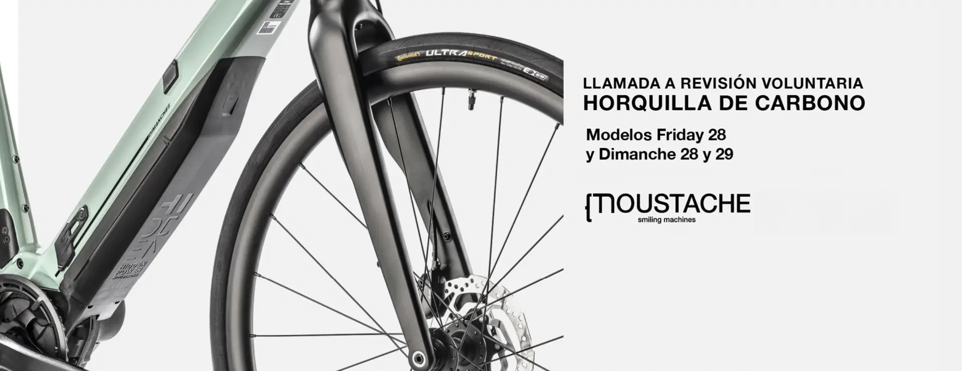 Primer plano de una horquilla de bicicleta Moustache, que destaca el retiro voluntario de los modelos Friday y Dimanche 28 y 29 debido a posibles problemas.