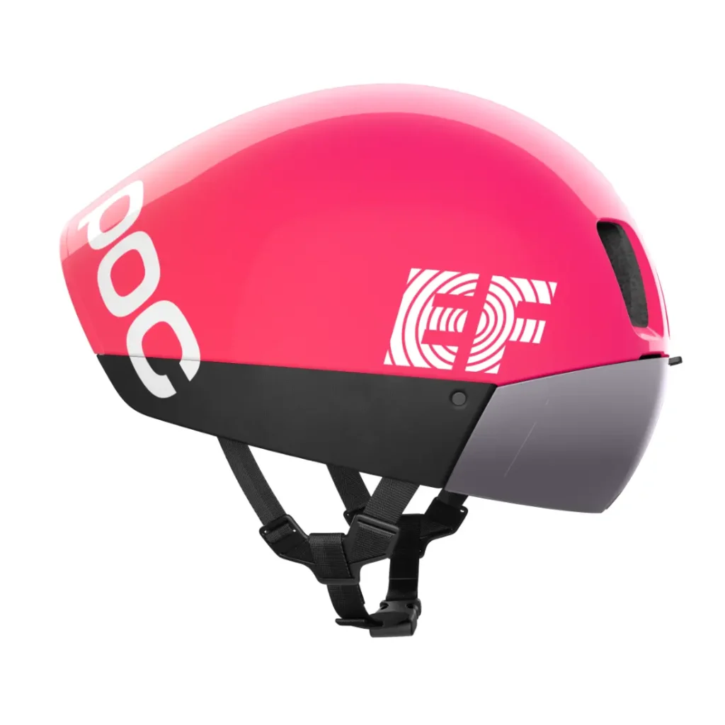 El casco de ciclismo POC Procen Air EF Pro cuenta con un diseño elegante y aerodinámico en un rosa vibrante, con los logotipos "POC" y "EF". Ideal para ciclistas profesionales, incluye una correa ajustable para la barbilla para un ajuste seguro.