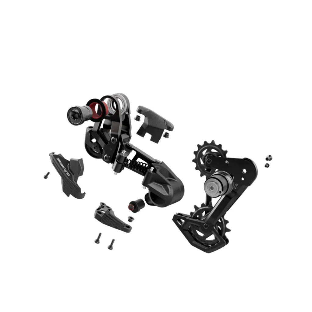 Un desviador de bicicleta SRAM Eagle 90 desmontado con varios componentes, incluidos engranajes, tornillos y soportes, extendidos sobre un fondo blanco muestra la intrincada artesanía de los cambios mecánicos.