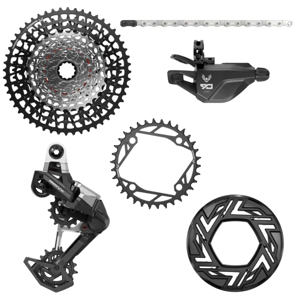 Descubra la serie SRAM Eagle 90, que incluye componentes de transmisión de bicicleta de primera calidad, como cassette, cadena, descarrilador, plato, palanca de cambios y brazos de biela sobre un fondo blanco impecable.