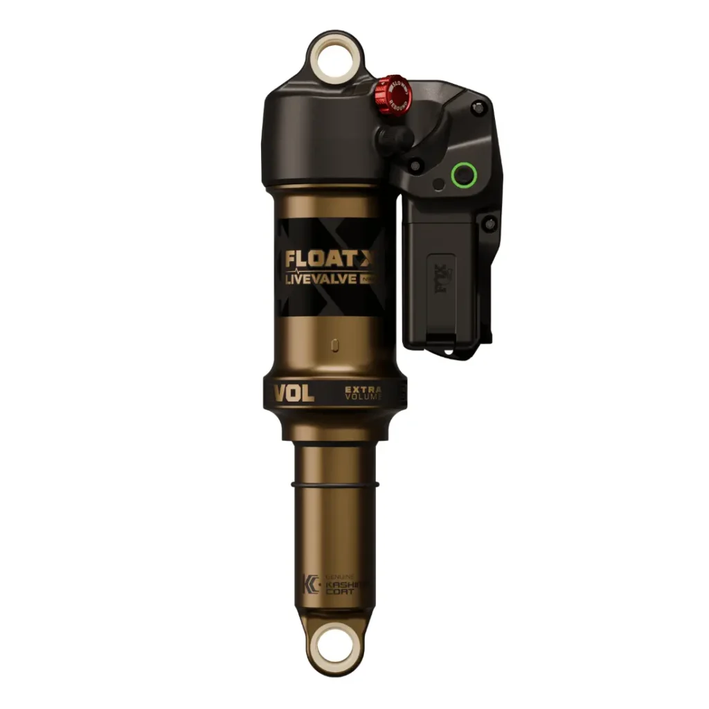 Un amortiguador trasero FOX Float X Live Valve dorado y negro para bicicleta de montaña con módulo de ajuste electrónico incorporado, este X Factor en amortiguadores ofrece un rendimiento de precisión para senderos exigentes.