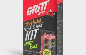 Caja del kit de limpieza y lubricación para la transmisión «Gritt» de Leatt, que contiene dos botes de aerosol y un cepillo de limpieza.