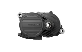 Un motor Avinox M2S negro para bicicleta eléctrica con puntos de montaje y engranaje visibles, sobre fondo blanco.