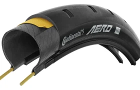 Vista en corte del neumático de bicicleta Continental AERO 111, que muestra sus intrincadas capas internas y su estructura.