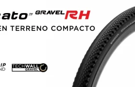 El neumático de bicicleta Pirelli Cinturato Gravel RH, ideal para terrenos compactos, cuenta con las tecnologías SpeedGrip Compound y TechWall Gravel. Esta opción premium de neumáticos gravel se muestra sobre fondo blanco.