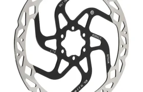 Un disco de freno de bicicleta Brembo GR-PRO con el centro negro y el borde exterior plateado, con dibujos recortados y marcas técnicas, ideal para frenos para e-MTB.